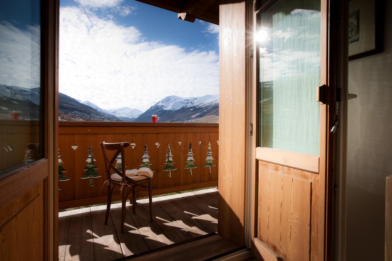 Les Fleurs Bleues Aparthotel Livigno Exterior photo